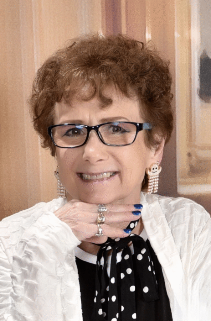 Sandy, the stylist smiling